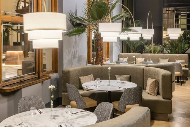 NH_Collection_Prague_Carlo_IV_Restaurant_interior_empty_rounded_sofas_lamps-8166x5447