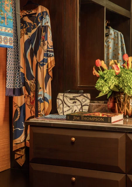 Anantara_Siam_Bangkok_Hotel_Guest_Room_Amenity_Two_Bedroom_Jim_Thompson_Explorer_Suite_Closet_With_Jim_Thompson_Merchandise