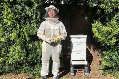 10. Finalist 2024 - Solo team HiveHealthy - Vince Wu standing by his honeybee hives