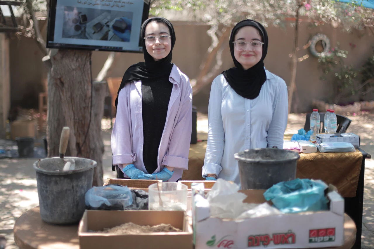Farah and Tala Mousa lead a hands-on Build Hope workshop. Photo by Ali Awad.