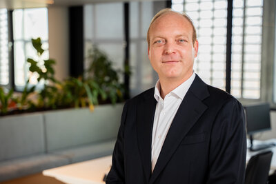 Headshot profile pictures of Financial Director Thomas Heerink