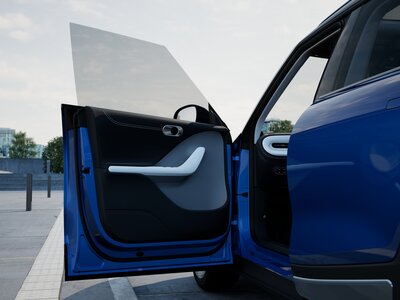 hx11-eu-pulse-darkmatter-quantumblue-eclipseblack-ext-013-framelessdoor-urban