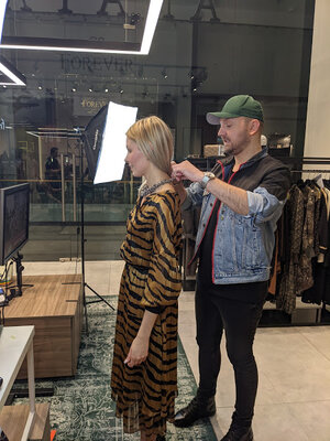 Stylist providing assitance during modleing at the Anataka EPP livestreaming event.jpg