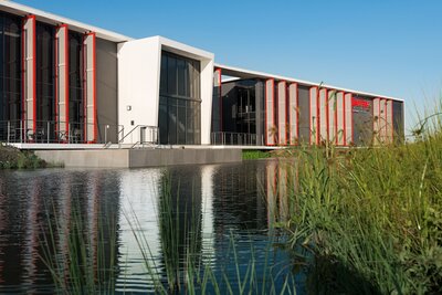 Exterior view of Bakers transport with red fire water pipes as steel lat....jpg