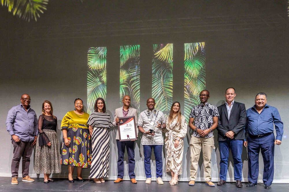 Neil Gopal award for 20 years of service.jpg