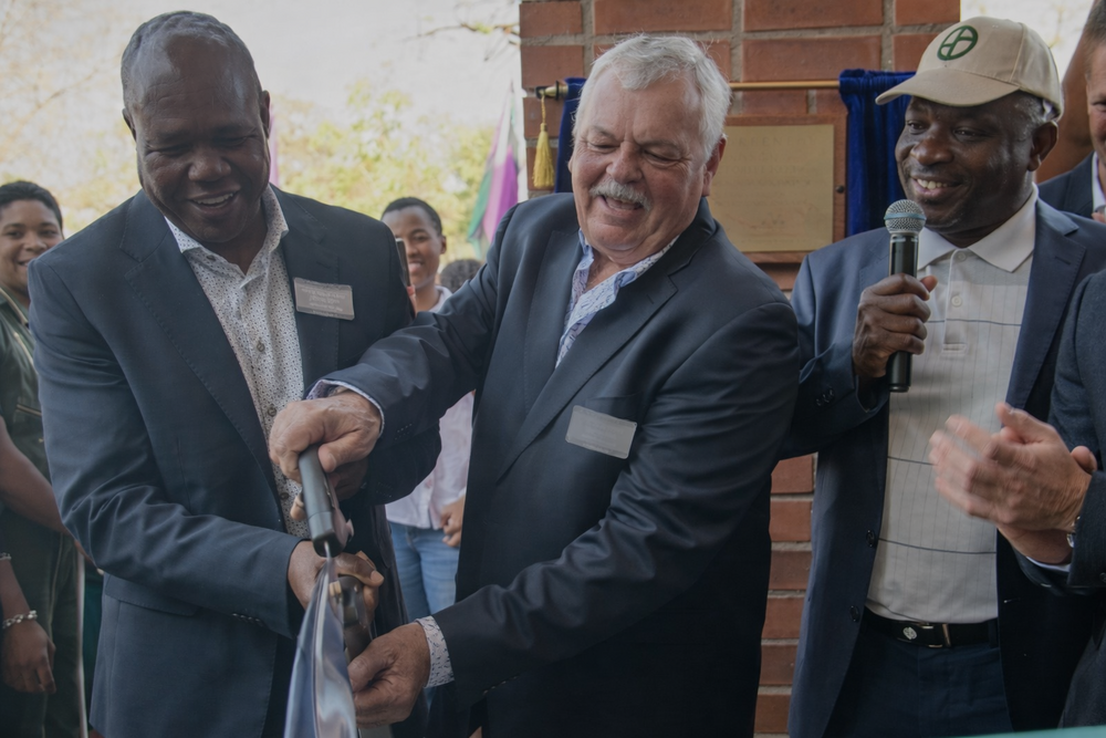 Ribbon-cutting ceremony in the park.png