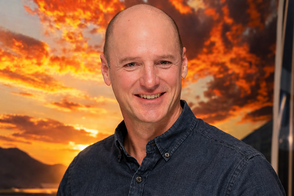 Warm sunset portrait of a man.png