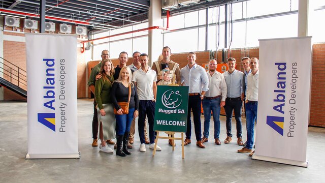 25257_The Abland Property Developers and Rugged SA teams celebrate the roof wetting at the new Rietvlei Business Park..jpg