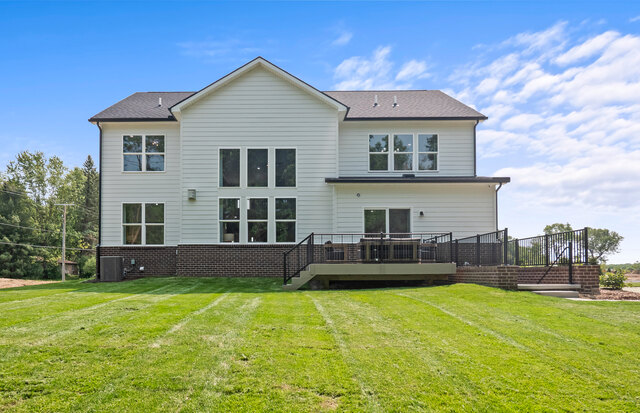 mi-pu-wc-woodsidemodel-lot00100-elevhr2f-extreardaylight.jpg