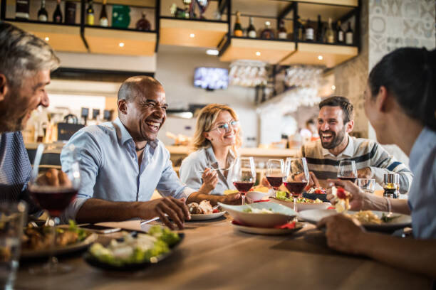 800_group-of-cheerful-business-people-having-fun-on-a-lunch2.jpg