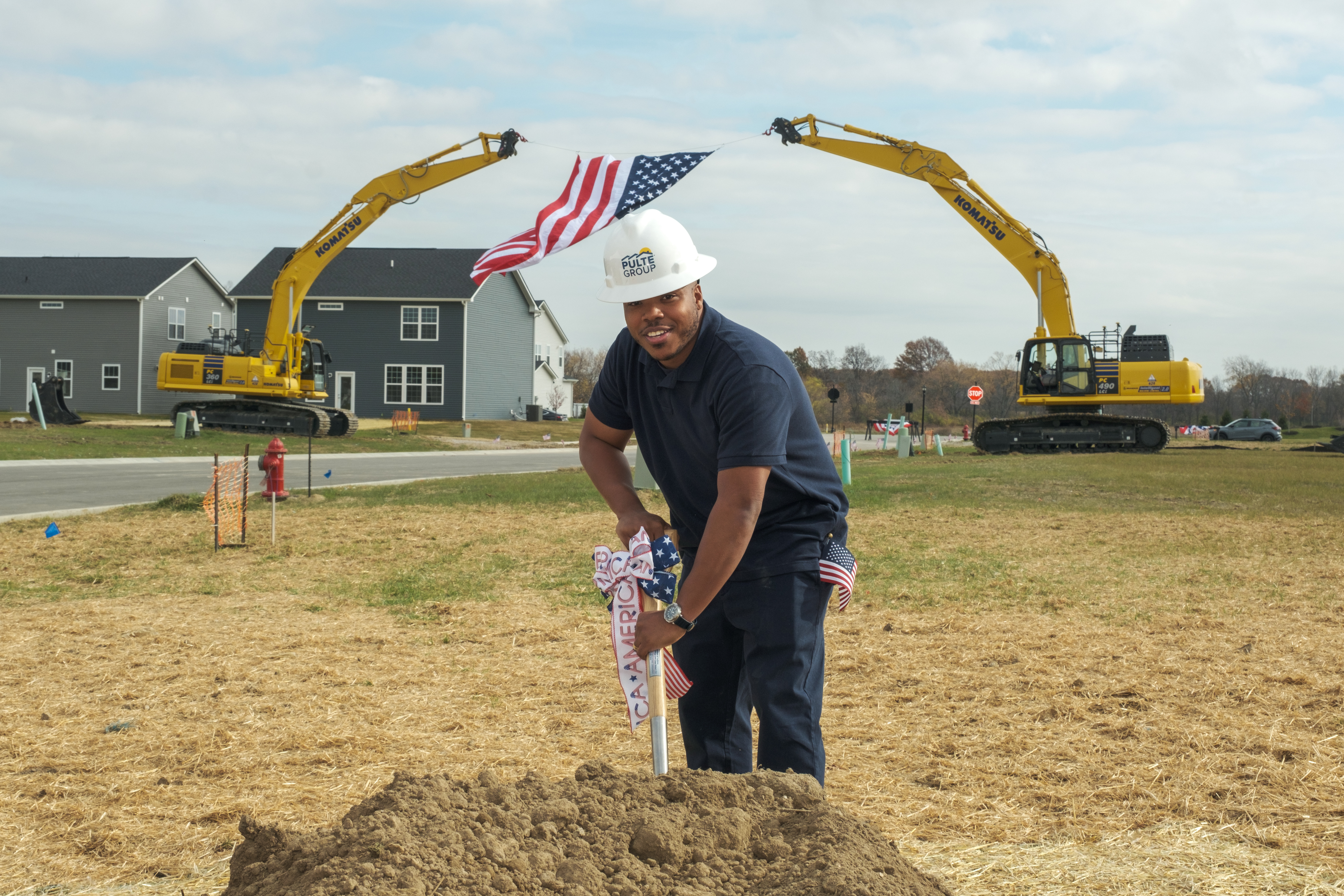 pultegroupsurprisesnavyveteranwithbuilttohonorreghomegroundbreakingevent.jpg